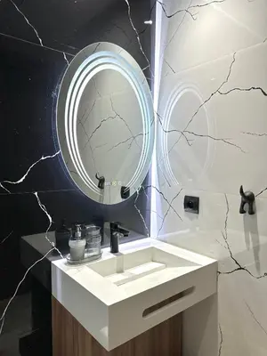 a bathroom with a white sink and a mirror at NESK STAY Maarif - ARENA 41 in Casablanca