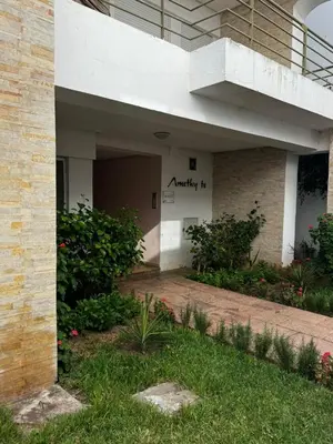 an outside view of a building with a balcony at Les Perles de Tamaris Beach access Pools in Casablanca