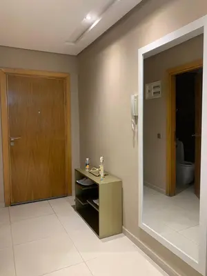 a bathroom with a sink and a mirror and a toilet at Chic & secure in Casablanca
