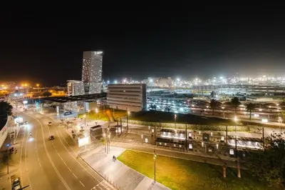 a city at night with buildings and lights at Confort Urbain Casablanca Vue Accès Gare Casa Port in Casablanca
