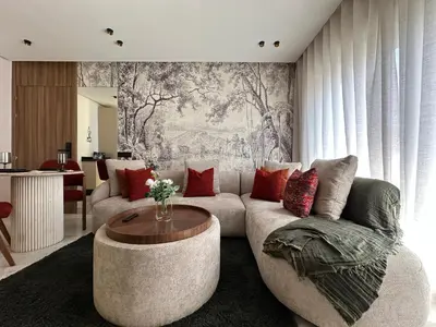 a living room with a couch and a coffee table at Arena Maarif in Casablanca