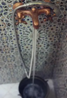 a pipe is coming out of a faucet at Rabat Apartments in Rabat