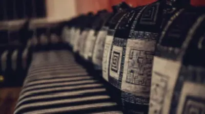 a row of pillows lined up on a couch at Rabat Apartments in Rabat