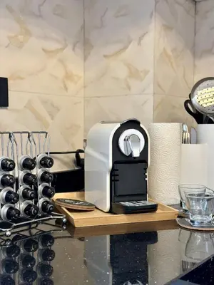 a coffee maker sitting on top of a counter at Appartement chic - Princesses in Casablanca