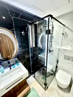 a bathroom with a shower and a sink and a toilet at ARENA 41- Maarif in Casablanca