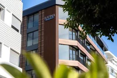 a building with a sign on the side of it at Rafina in Casablanca