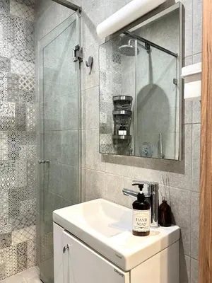 a bathroom with a sink and a shower at NESK STAY Gauthier in Casablanca