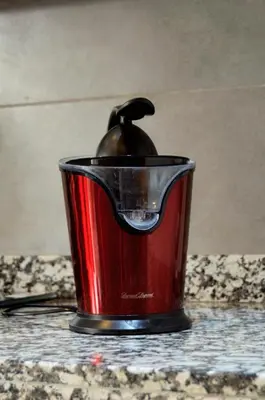 a red cup sitting on top of a counter at Villa 130 Spacieuse 4 chambres dar bouazza proche plage in Casablanca