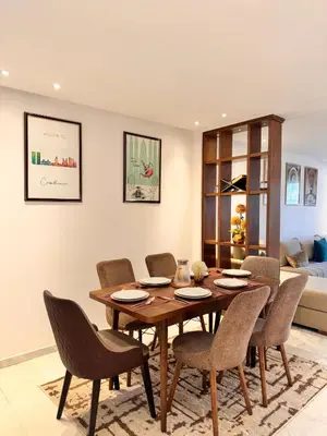 a dining room with a table and chairs at Central 2 bedrooms in Casablanca in Casablanca