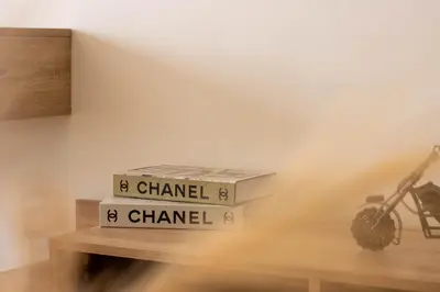a stack of books on top of a table at Panorama sur l'infini in Casablanca