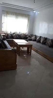 a living room with a couch and a coffee table at Sidi rehal in Sidi Rahal
