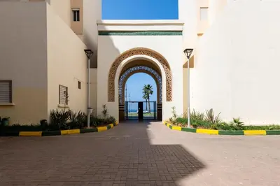an entrance to a building with an archway at Ocean Apartment in Rabat