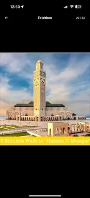 a picture of a building with a clock tower at Studio Cosy au Centre de Casablanca, Idéal pour Découvrir la Ville in Casablanca-Port