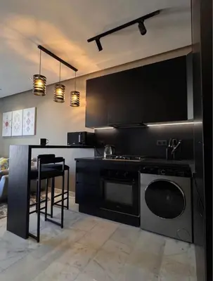 a kitchen with a stove and a dishwasher at Sunshine in Casablanca