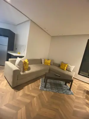 a living room with a couch and a coffee table at The Quiet House in Casablanca