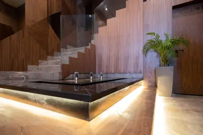 a bathroom with a sink and a staircase at Rafina in Casablanca