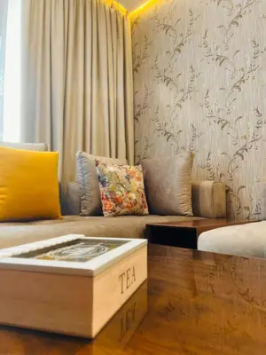 a living room with a couch and a coffee table at Rafina in Casablanca