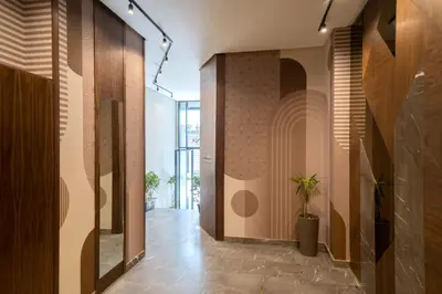 a hallway of a building with a tile wall at Rafina in Casablanca