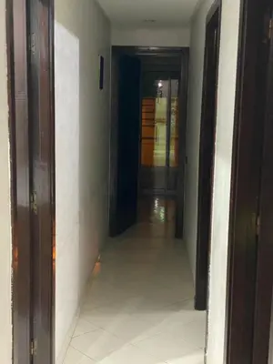 an empty hallway with a hallway leading into a room at The White House in Casablanca