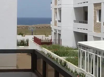 a view from the balcony of a building at Seaside apartment in El Mansouria in Mansouria