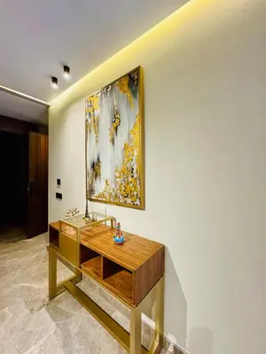 a bathroom with a sink and a painting on the wall at CYPRessa Loft - Nature and Serenity - Corniche Access in Casablanca