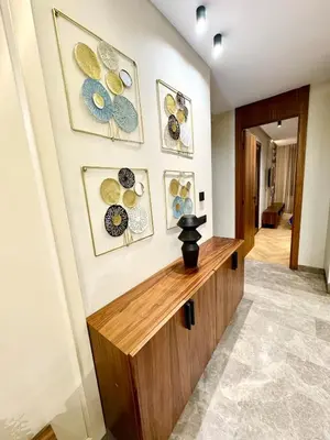 a room with plates on a wall with a counter at Domus Studio - Ambiance Zen au cœur de Casablanca in Casablanca