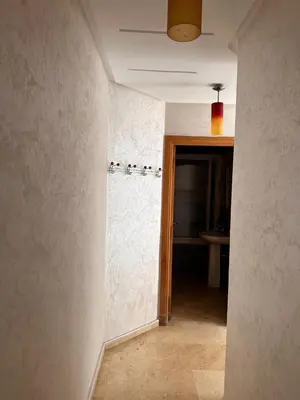 an empty room with a hallway with a door and a wall at Casa fbelvedère in Casablanca