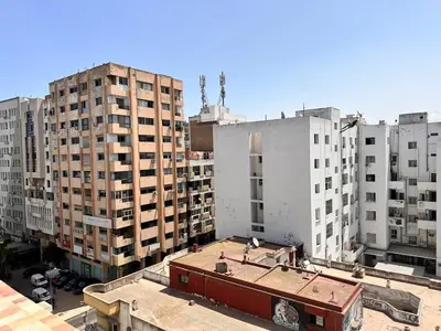an overhead view of a city with tall buildings at Casa fbelvedère in Casablanca