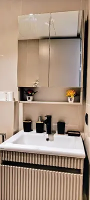 a kitchen with a large white sink in a room at Studio de charme face corniche de Casablanca in Casablanca