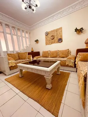 a living room with couches and a coffee table at Attractive Studio in Casablanca in Casablanca
