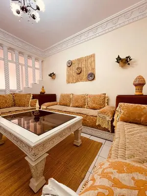 a living room with a couch and a coffee table at Attractive Studio in Casablanca in Casablanca