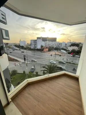 a large window with a view of a parking lot at Casawi in Casablanca