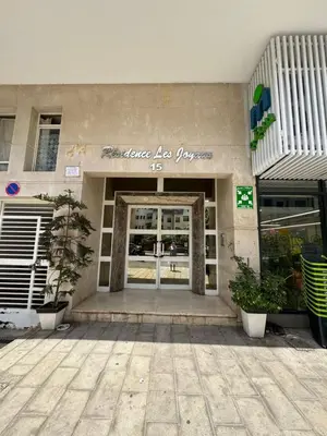 a store front with a sign that reads excellence lose paws its at BellaVita in Casablanca