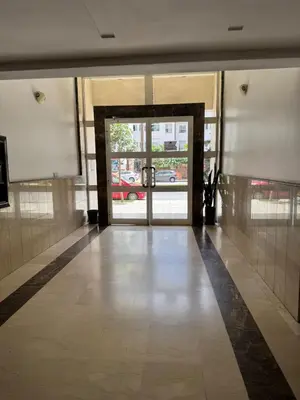 an empty hallway with a door to a building at BellaVita in Casablanca