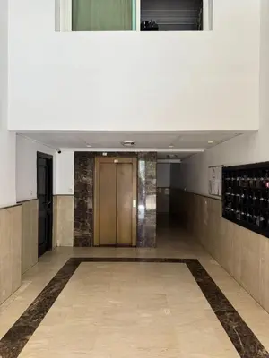 a hallway with a door in a building at BellaVita in Casablanca