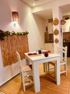 a white table and chairs in a kitchen at Havre de Paix in Casablanca in Casablanca