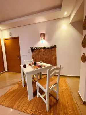 a white table and chairs in a room at Havre de Paix in Casablanca in Casablanca