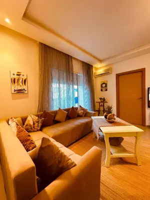 a living room with a couch and a table at Havre de Paix in Casablanca in Casablanca