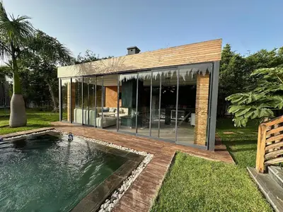a house with a swimming pool in the yard at 1700sqm Unique Villa in Bouskoura in Bouskoura