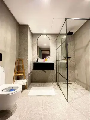 a bathroom with a toilet and a sink and a mirror at A102 Studio cosy & chic in Casablanca