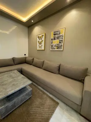 a living room with a couch and a table at Stay Bright with Hometa in Casablanca