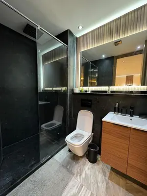 a bathroom with a toilet and a sink and a shower at Stay Bright with Hometa in Casablanca