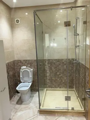 a bathroom with a shower and a toilet at Kettani Shems Bouznika in Bouznika