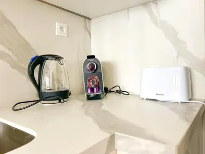 a counter with a blender and a toaster on it at Small Cozy Nest in Quiet Area - Central with Balcony in Casablanca