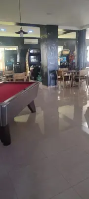 a room with a pool table in a mall at yakout in Mohammedia
