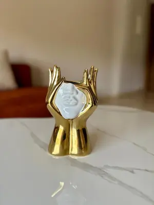 a gold statuette of a cat on a table at The Hidden Secret in Casablanca