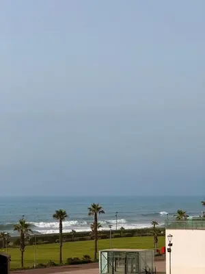 a volleyball court with the ocean in the background at Luxury Apartment Ocean View and Private Beach Ain Diab in Casablanca