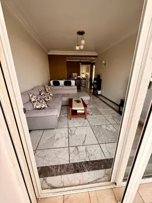 an overhead view of a living room with a couch at Luxury Apartment Ocean View and Private Beach Ain Diab in Casablanca