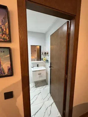 a bathroom with a sink and a mirror at Au Petit Port Balcony & Sea view 5 mn from casa-port in Casablanca