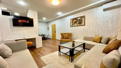 a living room with a couch and a table at 1min walk B&B City Center in Casablanca